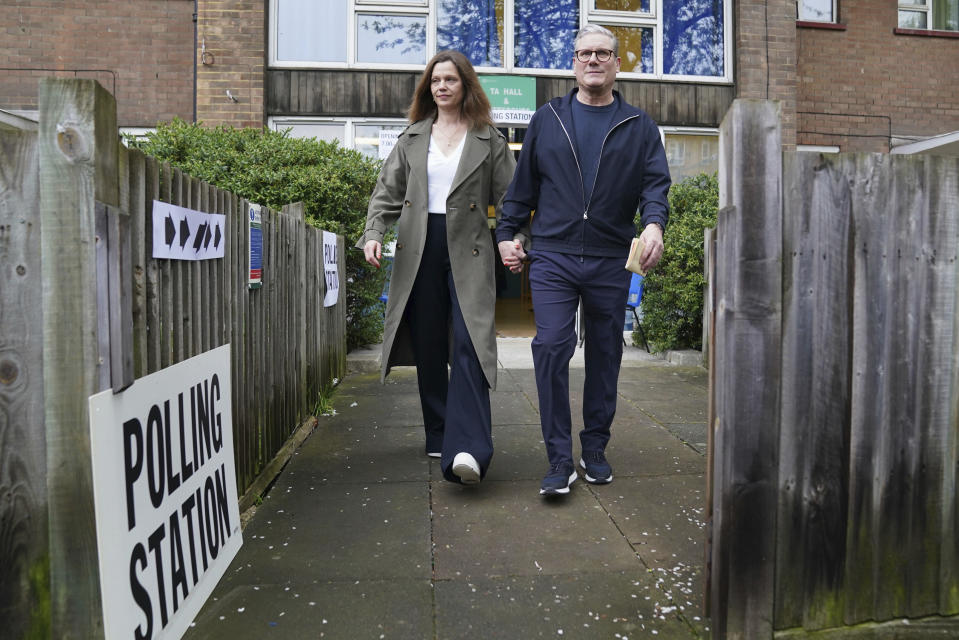 Britain's Labour leader Keir Starmer and his wife Victoria leave the polling station in his Holborn and St Pancras constituency, after casting their votes in the local and London Mayoral election, in north London, Thursday May 2, 2024. (Stefan Rousseau/PA via AP)