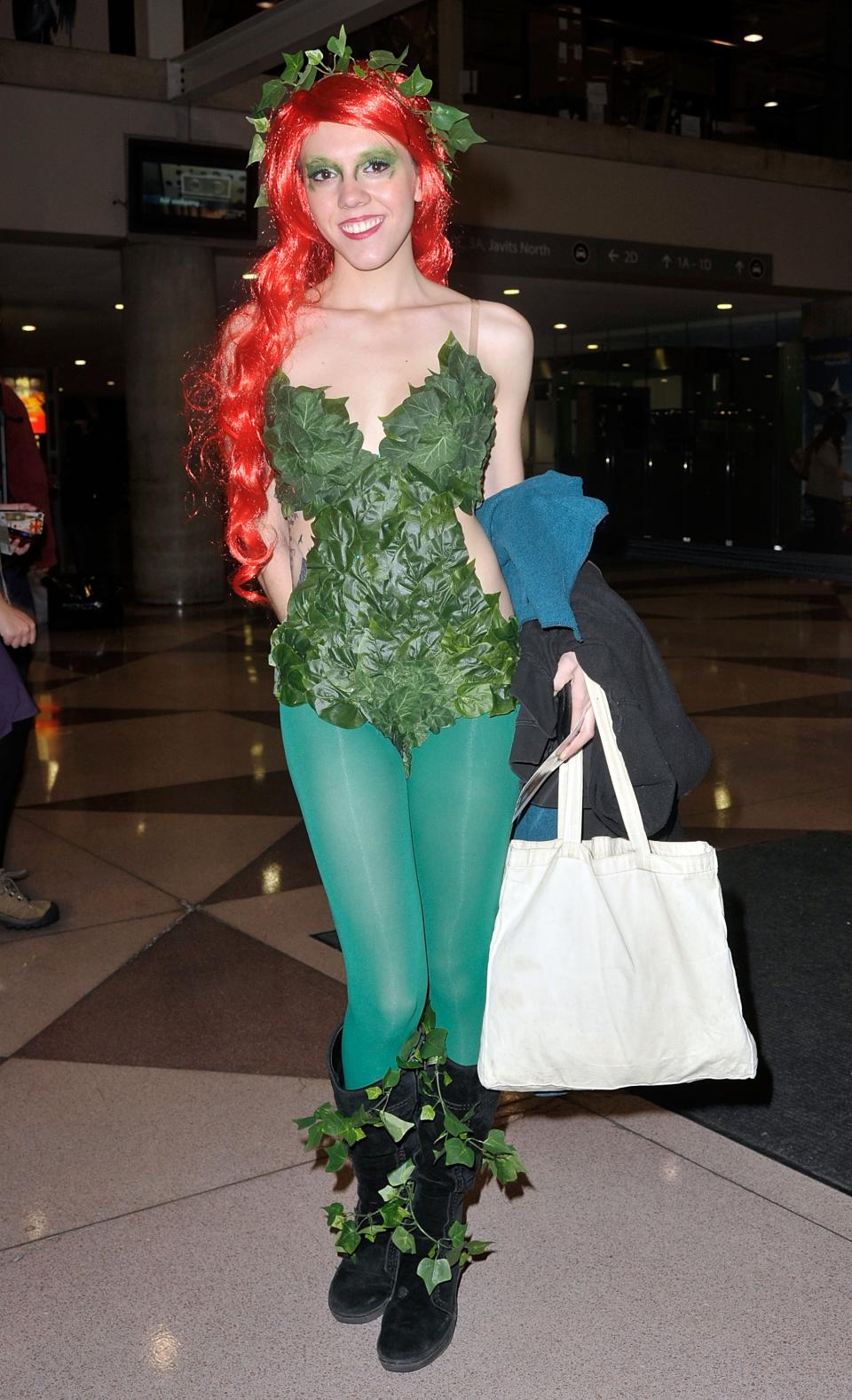 NEW YORK, NY - OCTOBER 11: A Comic Con attendee wearing a Poison Ivy costume poses during the 2012 New York Comic Con at the Javits Center on October 11, 2012 in New York City. (Photo by Daniel Zuchnik/Getty Images)