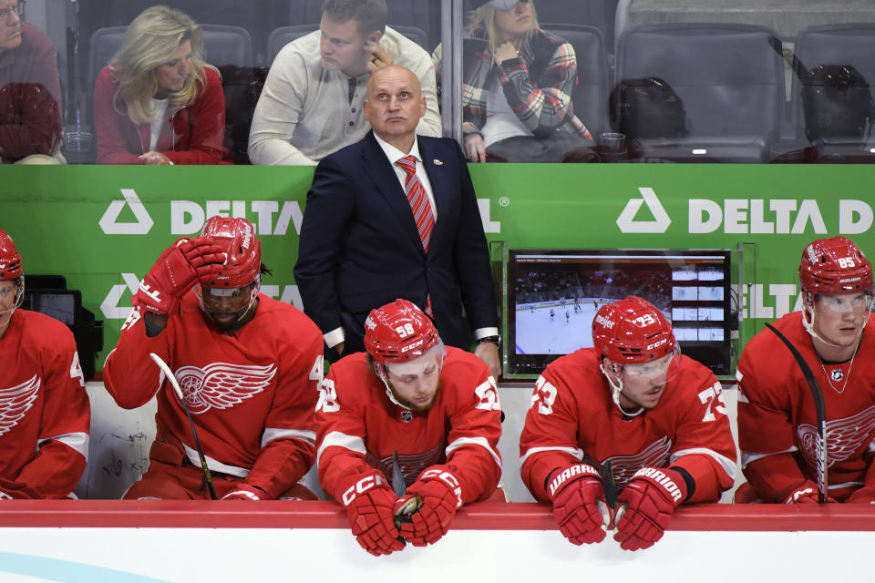 Detroit Red Wings coach Derek Lalonde looks at the scoreboard during the first period of the team's NHL preseason hockey game against the Chicago Blackhawks, Wednesday, Sept. 28, 2022, in Detroit. (AP Photo/Jose Juarez)