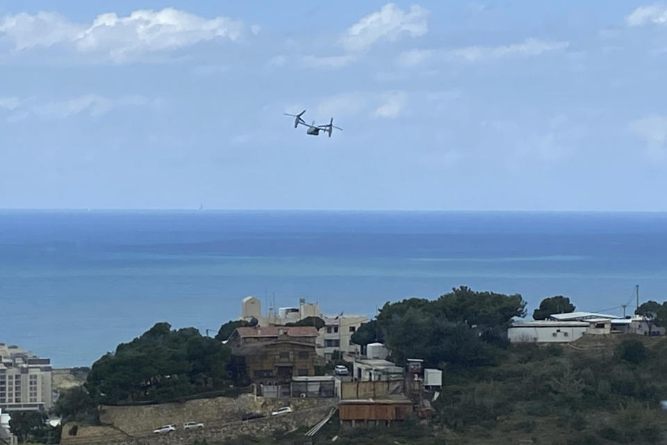 A U.S. Marine Osprey is seen taking off from the U.S. Embassy in Aukar, northeast of Beirut, Lebanon, Thursday, March 19, 2020. The aircraft took off a few hours before a U.S. senator announced that Lebanese-American Amer Fakhoury, who had faced decades-old murder and torture charges in Lebanon, was freed from a prison in Lebanon. Lebanese officials alleged that Fakhoury, 57, of Dover, New Hampshire, who had been jailed since September, was responsible for the killings and abuse of prisoners in Lebanon as part of an Israeli-backed militia two decades ago. (AP Photo/Zeina Karam)