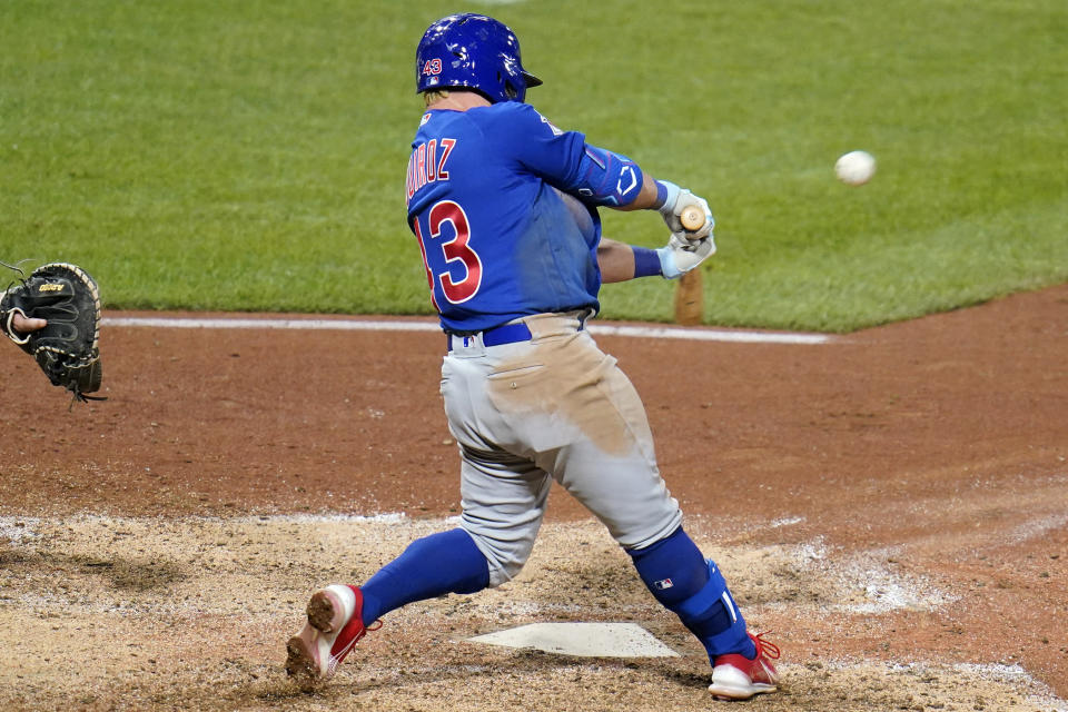 Chicago Cubs' Esteban Quiroz hits an RBI single off Pittsburgh Pirates relief pitcher Yohan Ramirez during the eighth inning of a baseball game in Pittsburgh, Friday, Sept. 23, 2022. (AP Photo/Gene J. Puskar)