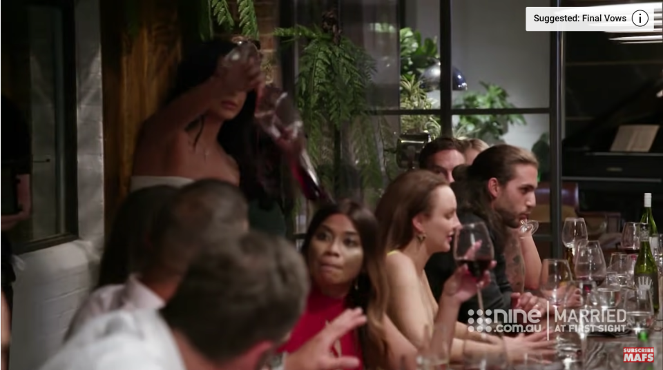 During 2019 Married At First Sight, Martha tips her glass of wine over Cyrell's head at the dinner party while the other diners are oblivious