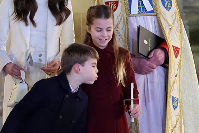 <p>Chris Jackson/Getty</p> Prince Louis and Princess Charlotte at the Christmas Carol Concert on December 8, 2023