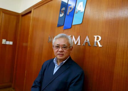 Yoma Chairman Serge Pun poses for a photograph in his office in Yangon, Myanmar March 24, 2014. REUTERS/Soe Zeya Tun/File Photo