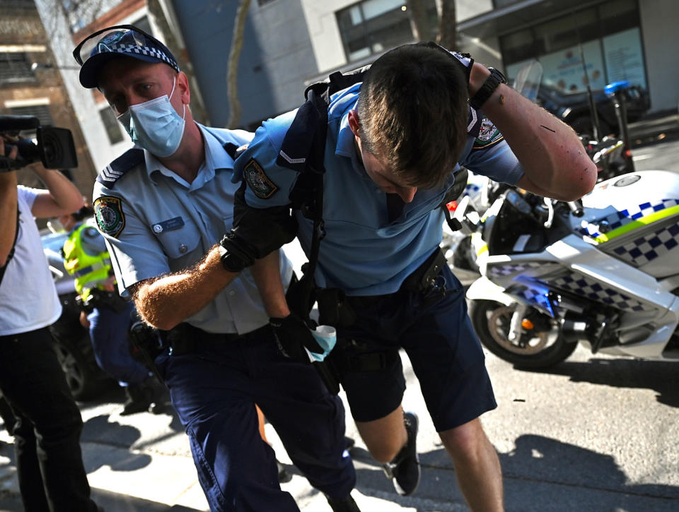 A police officer was injured during a anti-lockdown protest in Sydney on Saturday. Source: AAP