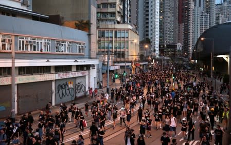 Anti-extradition bill protesters march in Kennedy Town, Hong Kong