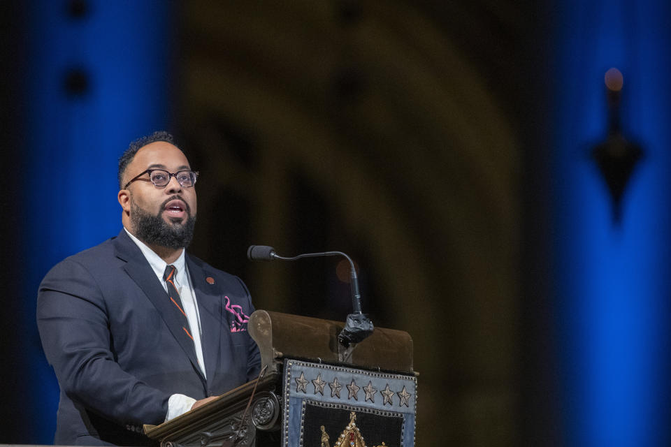 Poet Kevin Young speaks during the Celebration of the Life of Toni Morrison, Thursday, Nov. 21, 2019, at the Cathedral of St. John the Divine in New York. Morrison, a Nobel laureate, died in August at 88. (AP Photo/Mary Altaffer)