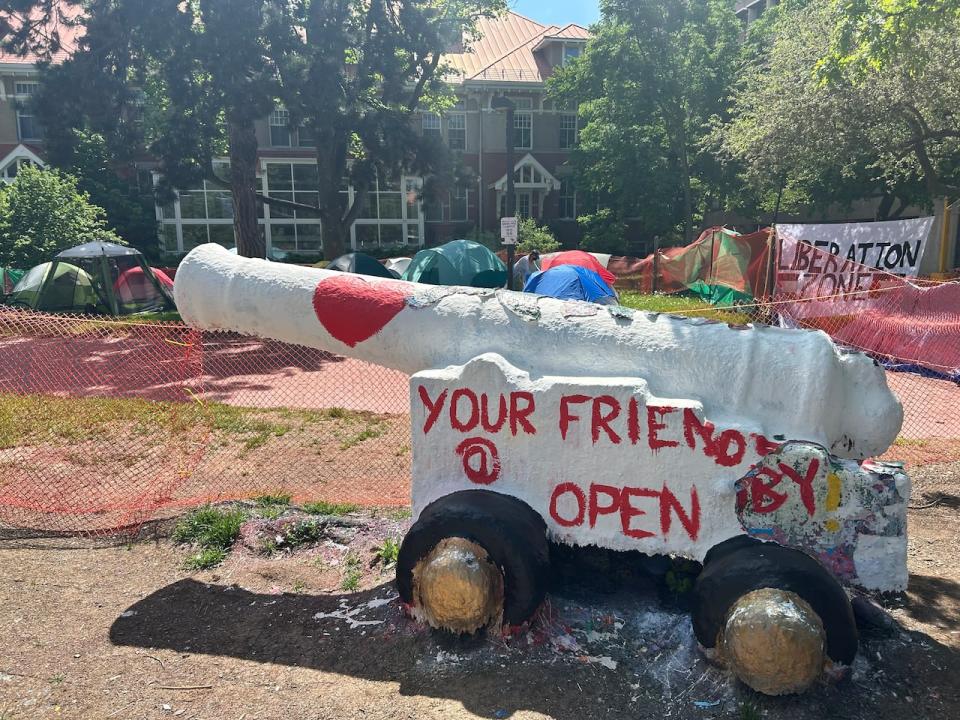 The encampment is located on campus near the library and the cannon located in Branion Plaza. The cannon is often painted by various student groups to promote events, holidays or significant events.