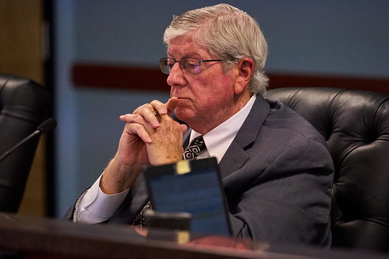 Commissioner Jim O'Connor asks a question as members of the public address the Arizona Corporation Commission during a public comment meeting at the Arizona Corporation Commission in Phoenix on Jan. 23, 2023.