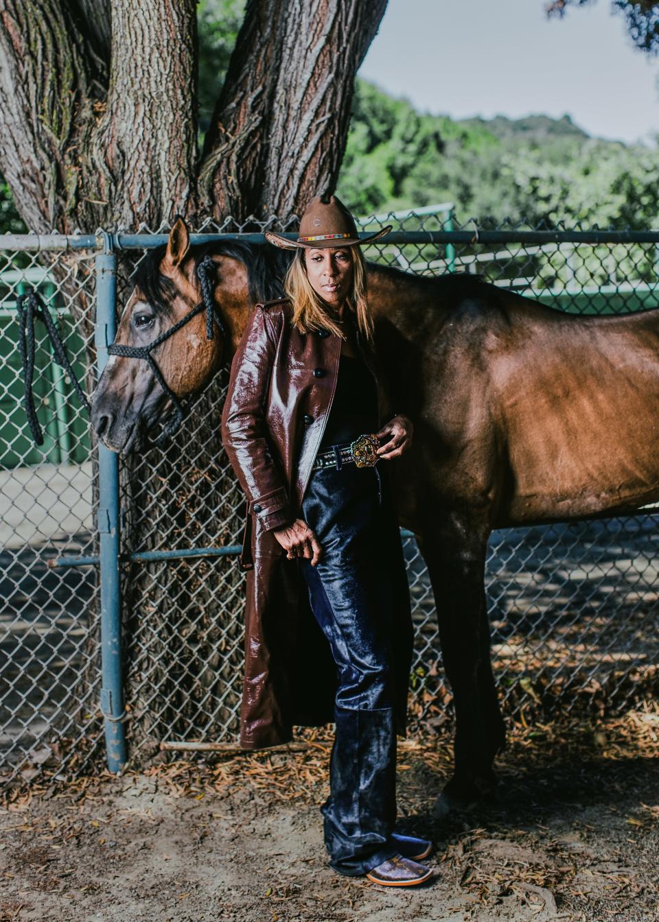 Shirt, Old Navy. Pants, Marni. Jacket, Ami. Boots, Louis Vuitton, her own. Hat, Charlie Horse. Belt, BB Simon.