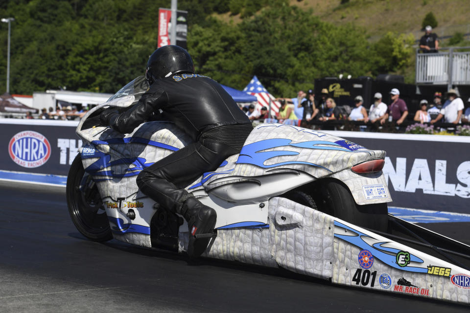 In this photo provided by the NHRA, Jerry Savoie rides his Pro Stock Motorcycle to take home a NHRA Thunder Valley Nationals win in Bristol, Tenn., Sunday, June 19, 2022. ( Jerry Foss/NHRA via AP)