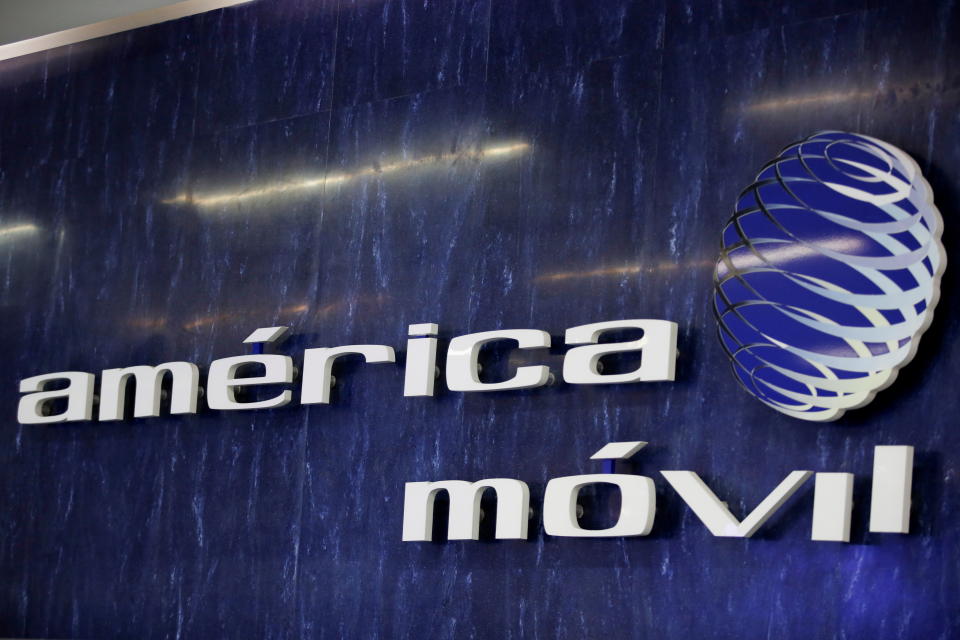 The logo of America Movil is pictured on the wall at a reception area in the company's corporate offices, in Mexico City, Mexico January 25, 2022. REUTERS/Gustavo Graf