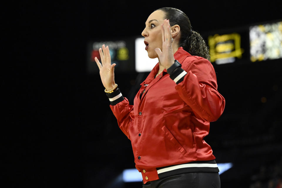 Arizona head coach Adia Barnes gestures on the sidelines during the first half of an NCAA college basketball game against UCLA in the quarterfinal round of the Pac-12 women's tournament Thursday, March 2, 2023, in Las Vegas. (AP Photo/David Becker)