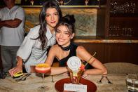 <p>Charli D'Amelio celebrates sister Dixie D'Amelio's 21st birthday at Resorts World Las Vegas' Carversteak on Aug. 11.</p>