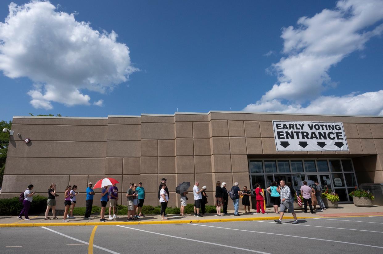 Voters line up in front of the Franklin County Board of Elections on July 31.