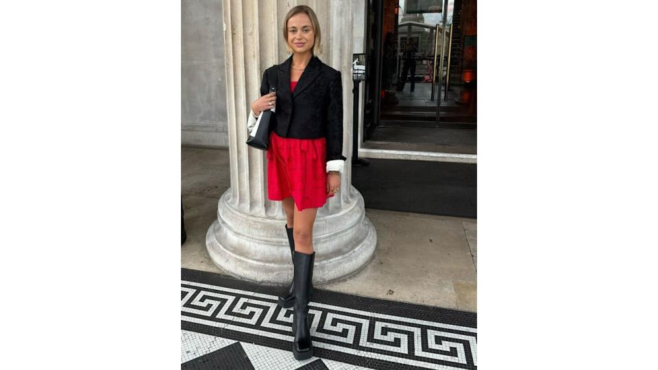 Lady Amelia Windsor in a red mini dress and knee-high boots