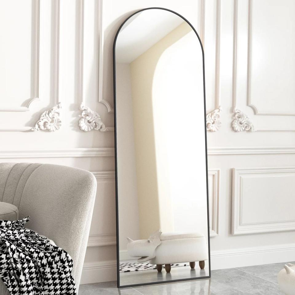 <p><a href="https://go.redirectingat.com?id=74968X1596630&url=https%3A%2F%2Fwww.walmart.com%2Fip%2FBEAUTYPEAK-Arched-Full-Length-Floor-Mirror-64-x21-1-Full-Body-Standing-Mirror-Black%2F414919150&sref=https%3A%2F%2F" rel="nofollow noopener" target="_blank" data-ylk="slk:Shop Now;elm:context_link;itc:0;sec:content-canvas" class="link ">Shop Now</a></p><p>Arched Full Length Floor Mirror</p><p>walmart.com</p><p>$59.00</p>