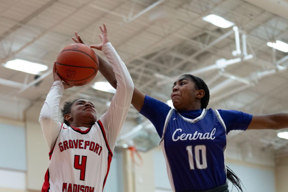 Pickerington Central's Kennady Gordon tries to block a layup from Groveport's Tatyana Bailey during a Jan. 5 game.