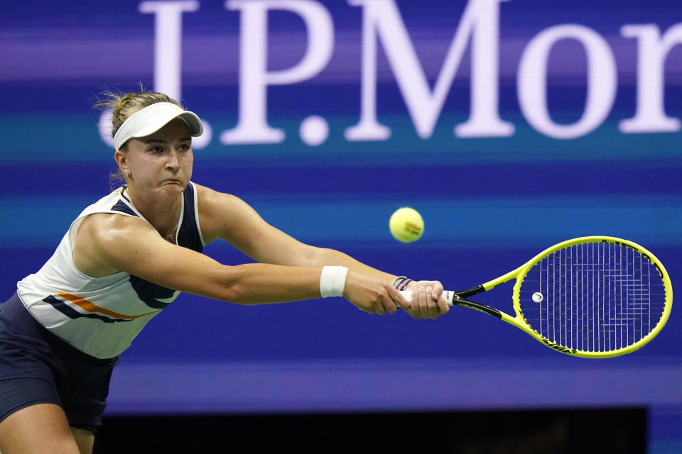 Barbora Krejcikova, of the Czech Republic, returns against Garbine Muguruza, of Spain, during the fourth round of the US Open tennis championships, Sunday, Sept. 5 2021, in New York. (AP Photo/Frank Franklin II)