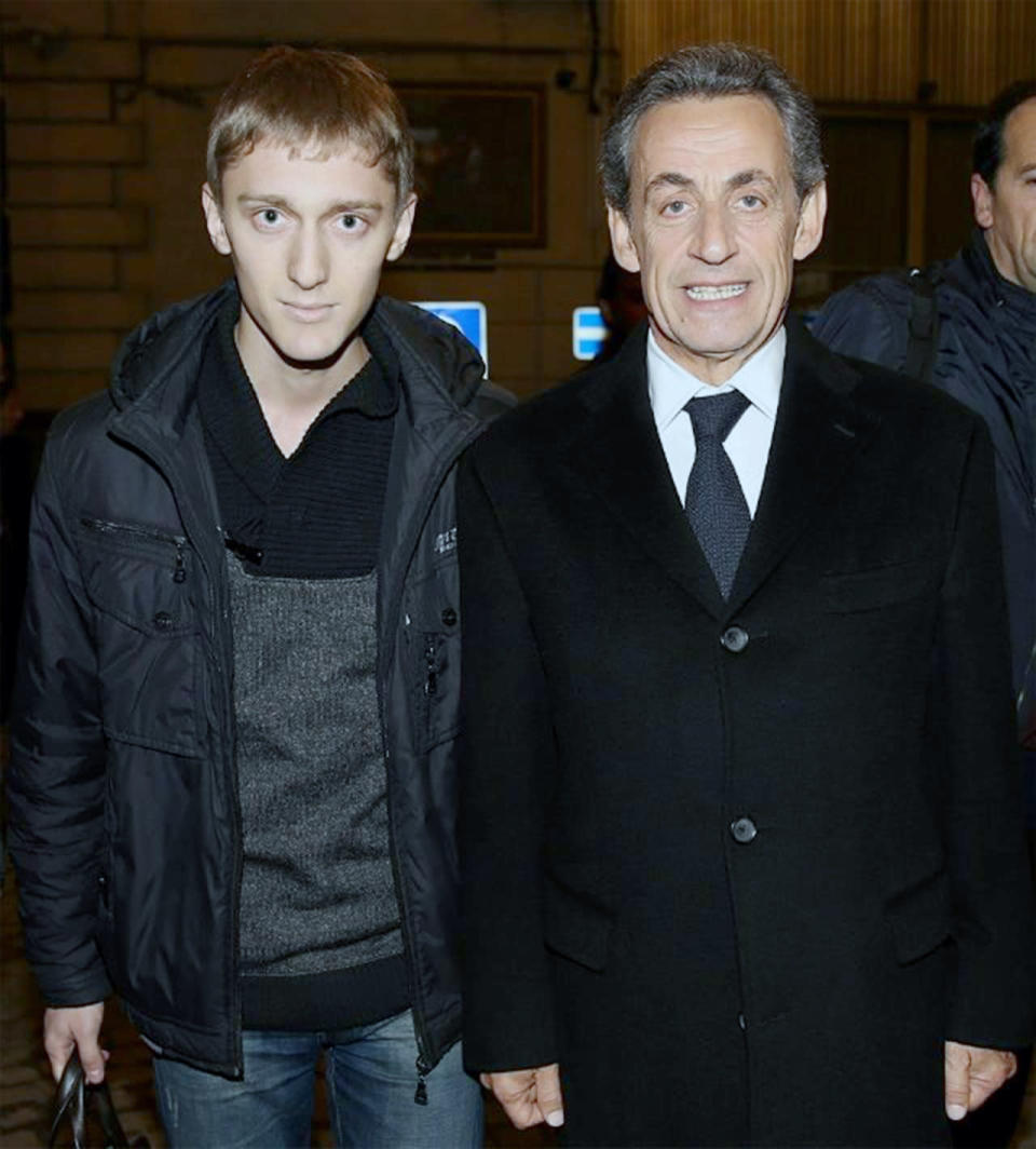 Nicolas Sarkozy looks happier than Ivan to be in the picture