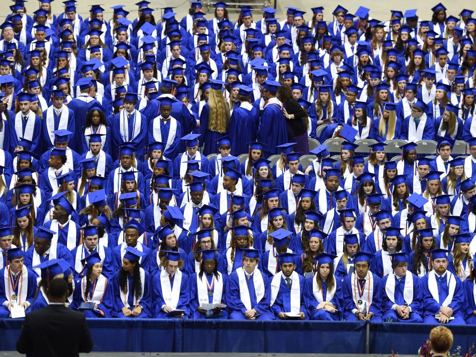 Students sit in the stands during a previous Madison Central High School graduation ceremony.