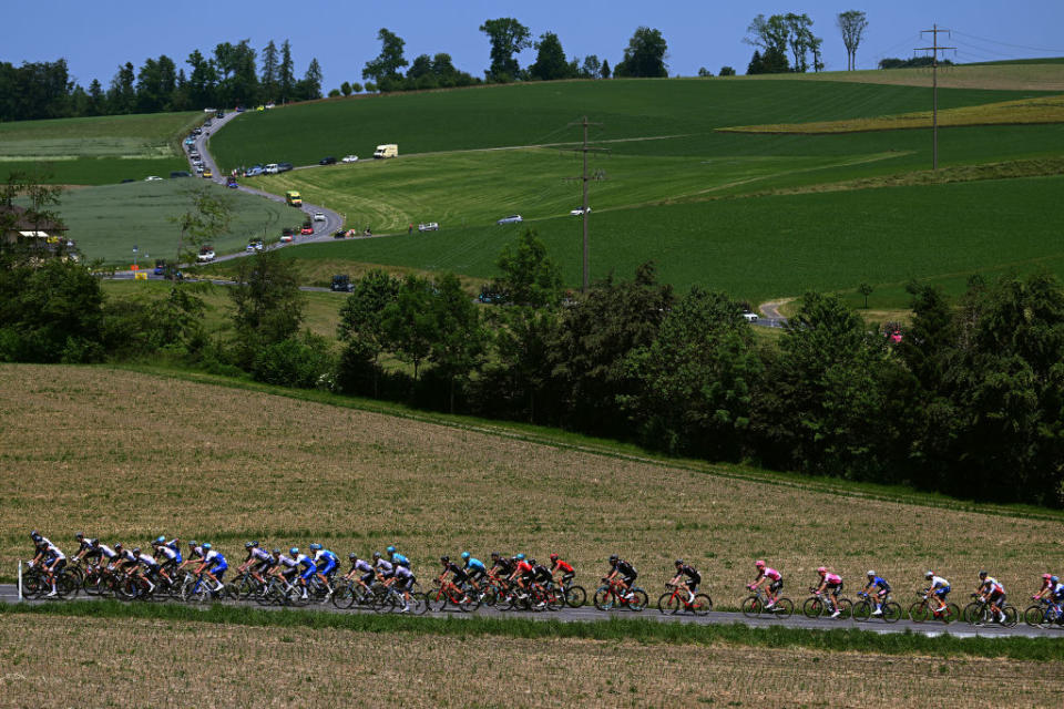 NOTTWIL SWITZERLAND  JUNE 12 A general view of the peloton passing through a landscape during the 86th Tour de Suisse 2023 Stage 2 a 1737km stage from Beromnster to Nottwil  UCIWT  on June 12 2023 in Nottwil Switzerland Photo by Dario BelingheriGetty Images