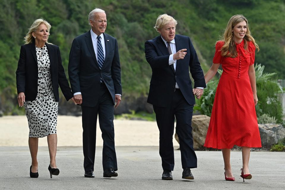 British Prime Minister Boris Johnson and his wife Carrie Johnson walk with U.S. President Joe Biden and First Lady Jill Biden prior to a bilateral meeting at the G7 summit in Cornwall, U.K.