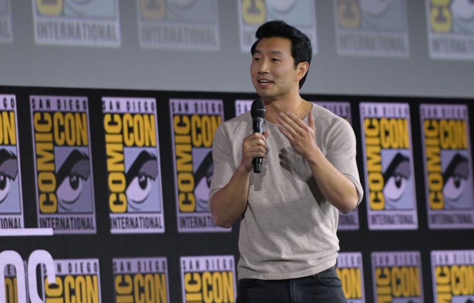 <p>File image: Simu Liu speaks on stage for the Marvel panel in Hall H of the Convention Center during Comic Con in San Diego in 2019</p> (Getty Images)