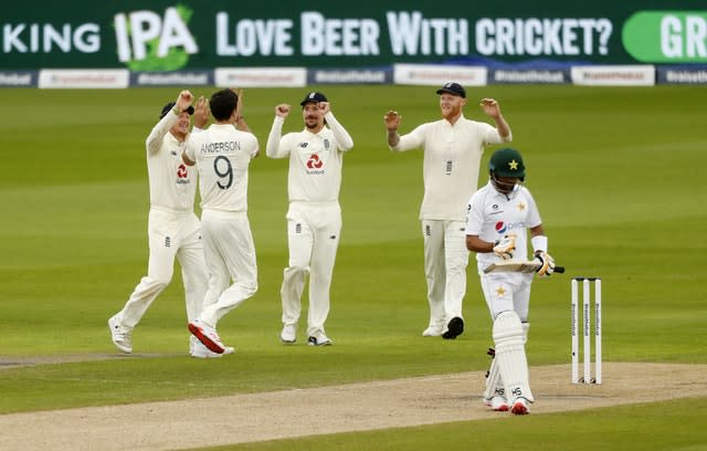 Anderson celebrates taking the wicket of Pakistan’s Babar Azam