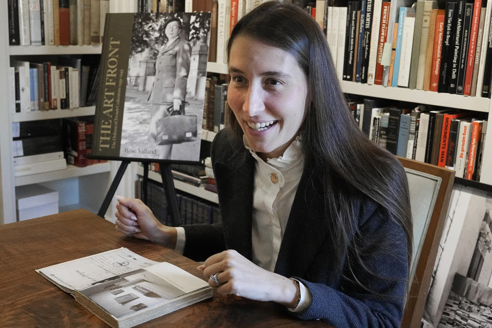 Anna Bottinelli, head of the Monuments Men and Women Foundation, smiles during an interview about the upcoming publishing of a book by Rose Valland in Dallas, Monday, Dec. 11, 2023. With the foundation's help Valland's book will be the first English translation of a the Monuments Woman work. (AP Photo/LM Otero)