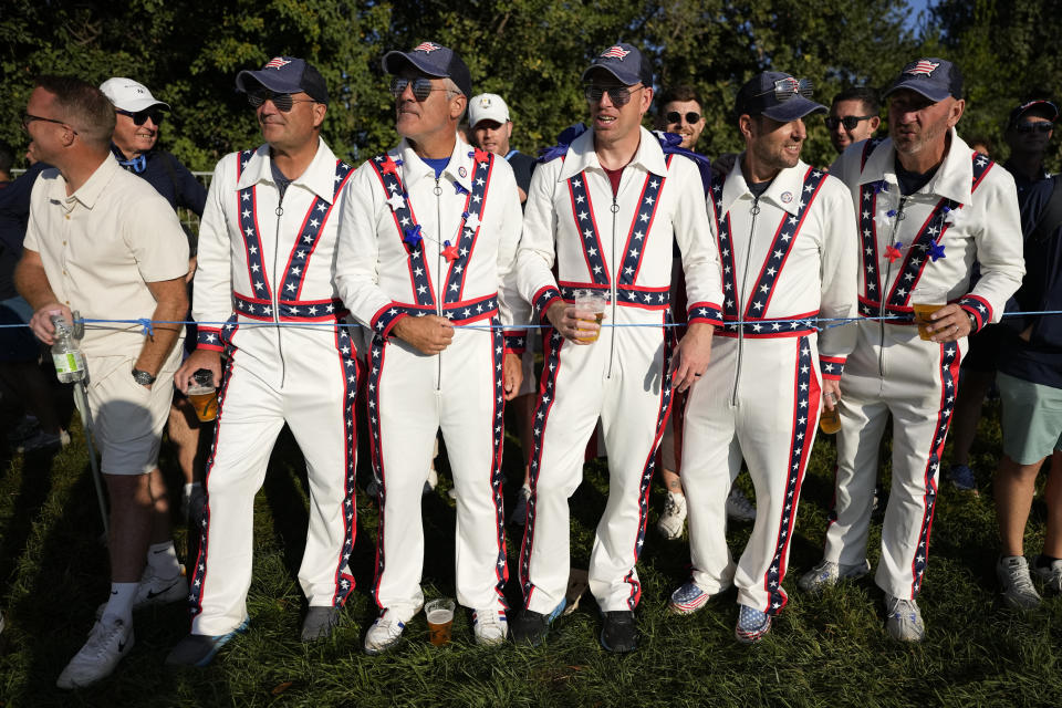 United Sates fans line the 3rd fairway as they watch the morning Foursomes matches at the Ryder Cup golf tournament at the Marco Simone Golf Club in Guidonia Montecelio, Italy, Saturday, Sept. 30, 2023. (AP Photo/Alessandra Tarantino)
