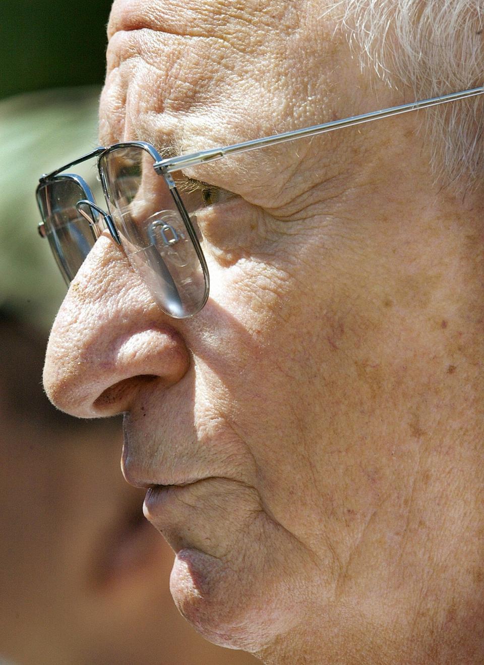 FILE - Baltimore Ravens owner Art Modell talks with reporters at the team's training camp in Westminster, Md. in this Aug. 6, 2002 file photo. The Baltimore Ravens said Modell died early Thursday Sept. 6, 2012 at Johns Hopkins Hospital, where he had been admitted Wednesday. A cause of death was not given. (AP Photo/Roberto Borea, File)