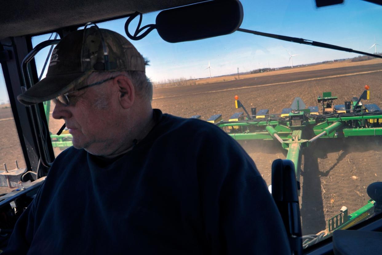 Crop farmer Bob Worth plants corn in one of the many fields on his family's 2,100 acres in Lake Benton, Minn., on Tuesday, May 2, 2023. Worth is a third-generation farmer who battled depression in the early '80s and now advocates for further help and deeper conversations around mental health and suicide prevention. (AP Photo/Jessie Wardarski)