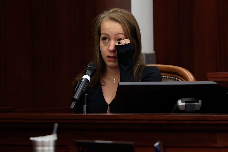 Noelle Gale reacts on the witness stand Monday in the first day of the sentencing phase for Patrick McDowell, who already pleaded guilty to killing Nassau County Deputy Joshua Moyers in September 2021. Jurors must decide to recommend a life or death sentence.