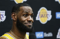 FILE - In this Sept. 27, 2019, file photo, Los Angeles Lakers forward LeBron James speaks during the NBA basketball team's media day in El Segundo, Calif. This season’s NBA MVP has won the award before. A trio of past winners of the award — reigning MVP Giannis Antetokounmpo of the Milwaukee Bucks, four-time MVP LeBron James of the Los Angeles Lakers and 2017-18 winner James Harden of the Houston Rockets — were announced Saturday, Aug. 8, 2020, as the finalists for this season’s top NBA individual honor. (AP Photo/Ringo H.W. Chiu, File)