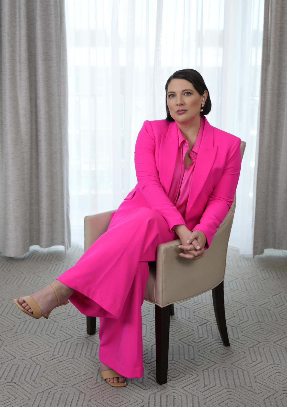 Taylor Jenkins Reid, author of the novel "Daisy Jones and the Six," poses for a portrait at the Four Seasons Hotel, Wednesday, Feb. 22, 2023, in Los Angeles. (AP Photo/Chris Pizzello)