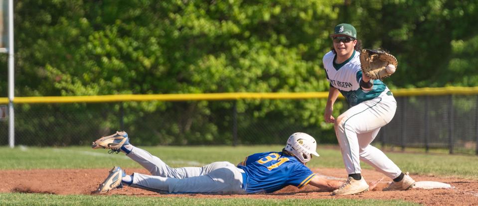 St. Joseph's Casey Cumiskey (31) dives to keep second base safe against  Spotswood on Wednesday, May 10, 2023 at the field at North Brunswick Community Park in North Brunswick.