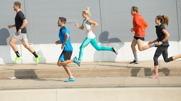 A group of runners in Under Armour apparel and shoes.