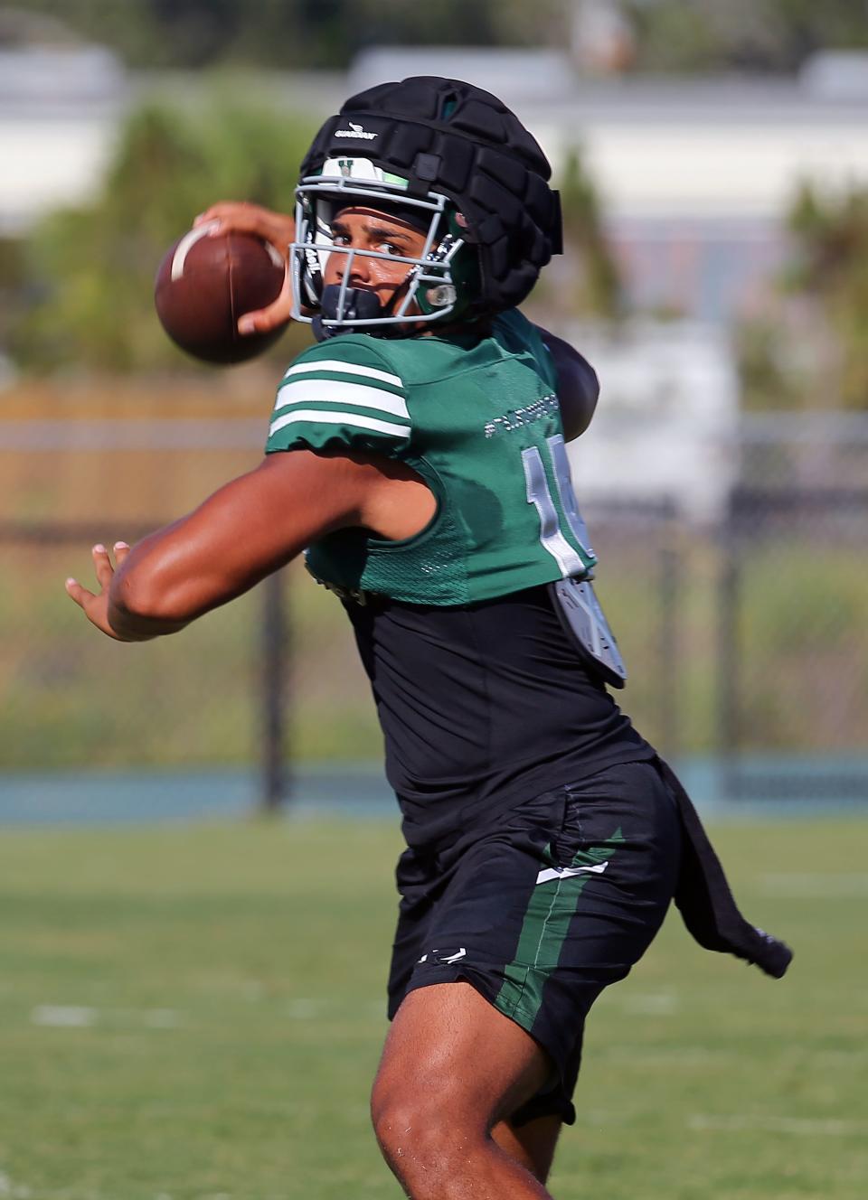 Venice High quarterback Jadyn Glasser throws a pass during a scrimmage against the Venice junior varsity team Friday, Aug. 11, 2023, at Powell-Davis Stadium. Glasser transferred from South Plantation High School for his senior season.