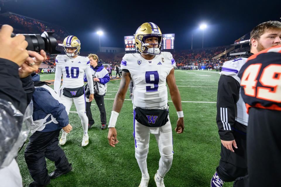 Washington Huskies quarterback Michael Penix Jr. walks off the field post game after a victory over the Oregon State Beavers at Reser Stadium.
