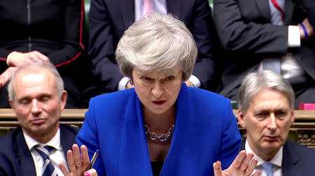 FILE PHOTO: British Prime Minister Theresa May gestures as she speaks during a no confidence debate after Parliament rejected her Brexit deal, in London, Britain, January 16, 2019, in this screen grab taken from video. Reuters TV via REUTERS/File Photo