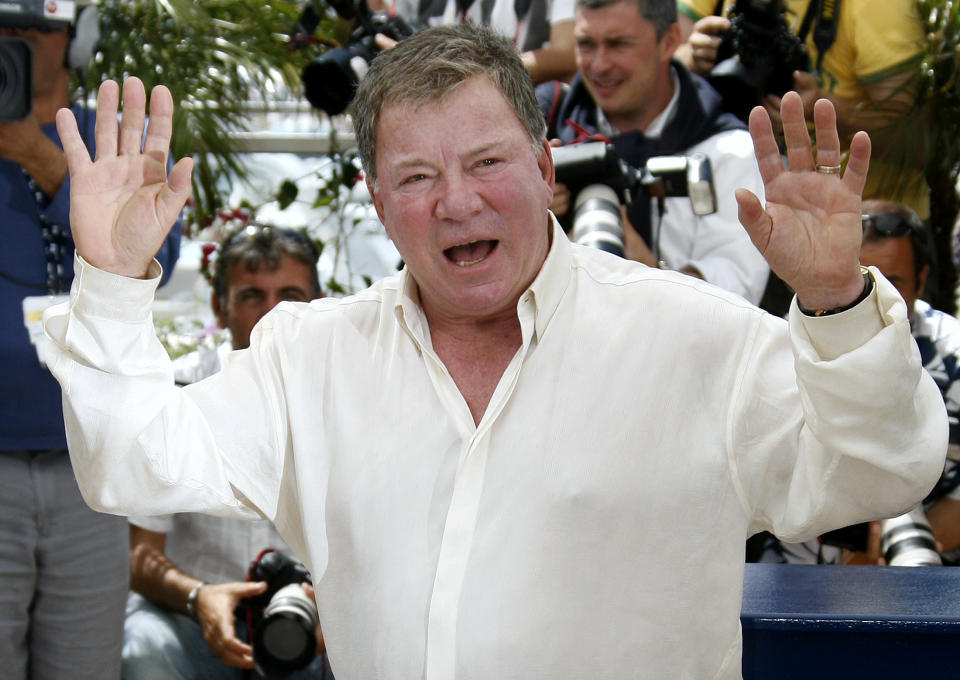 U.S. actor William Shatner waves as he leaves a photocall for directors Karey Kirkpatrick and Tim Johnson's out of competition animated film 'Over the Hedge' at the 59th Cannes Film Festival May 21, 2006.     REUTERS/John Schults
