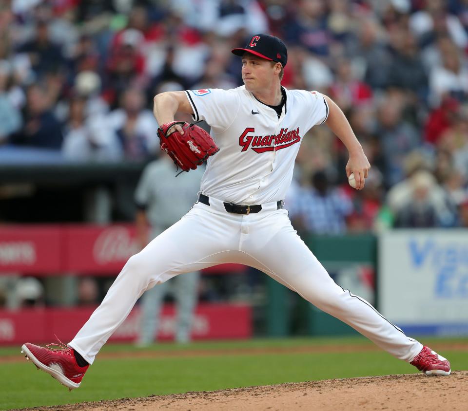 Cleveland Guardians pitcher Tim Herrin (29) throws during the Cleveland Guardians' home opener against the Chicago White Sox, Monday, April 8, 2024, in Cleveland, Ohio.