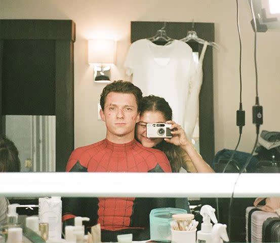 Tom Holland and Zendaya pose in a mirror selfie