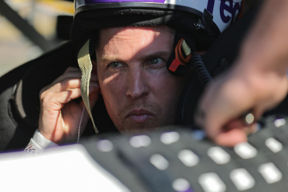 LAS VEGAS, NEVADA - OCTOBER 15: Denny Hamlin, driver of the #11 FedEx Office Toyota, sits in his car during practice for the NASCAR Cup Series South Point 400  at Las Vegas Motor Speedway on October 15, 2022 in Las Vegas, Nevada. (Photo by Jonathan Bachman/Getty Images)