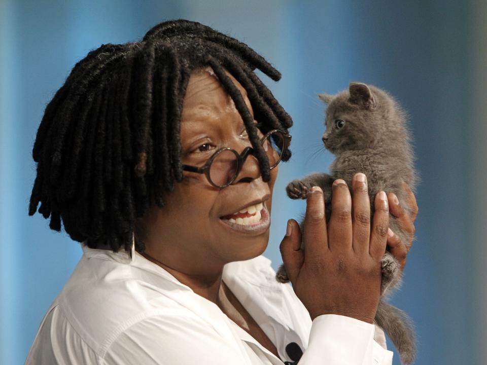 Whoopi Goldberg with her kitten