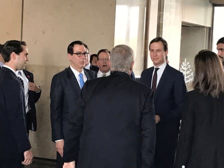 White House senior adviser Jared Kushner and Treasury Secretary Steven Mnuchin arrive at Manama's Four Seasons hotel, the venue for the U.S.-hosted "Peace to Prosperity" conference, in Manama