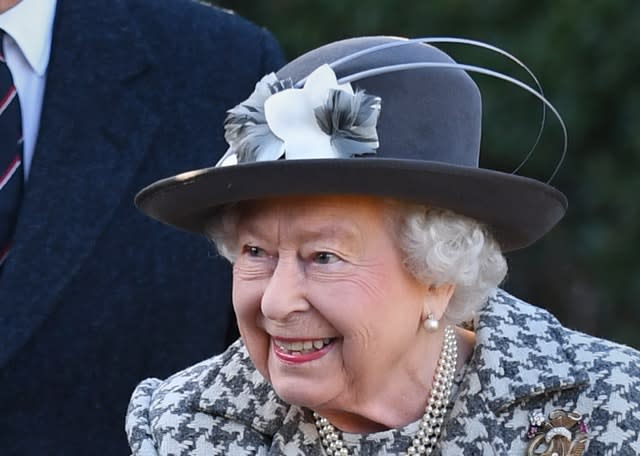 The Queen arrives at St Mary the Virgin in Hillington, Norfolk