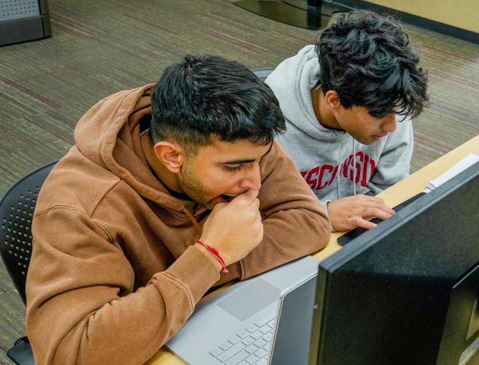 UW-Madison students Adi Bhargava, left, and Prab Kaginele do some homework Thursday, Nov. 16, 2023, inside of the engineering building at 1410 Engineering Drive that is proposed to be replaced with a new facility.