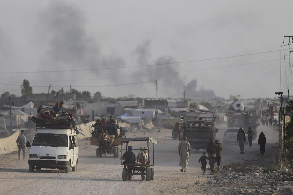 Palestinians fleeing from the southern Gaza city of Rafah during an Israeli ground and air offensive in the city on Tuesday, May 28, 2024. (AP Photo/Jehad Alshrafi)